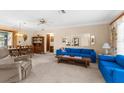 Open-concept living area with dining space, showcasing comfortable seating and ample natural light at 2072 Maguire Ave, Spring Hill, FL 34608