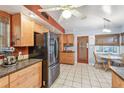 Well-lit kitchen with ample cabinet space, stainless steel refrigerator, and breakfast nook at 220 22Nd Se Ave, St Petersburg, FL 33705