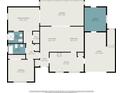This floor plan shows the home's layout including the primary bedroom, kitchen, living room, laundry and garage at 832 Fox Hills Dr, Sun City Center, FL 33573