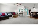 Cozy living room is adjacent to the kitchen at 7321 Central Ave # 503, St Petersburg, FL 33710