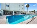 Beautiful pool with crystal clear water and plenty of lounge seating nearby at 7321 Central Ave # 503, St Petersburg, FL 33710