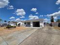 Cozy single-story home with an attached garage and low-maintenance front yard at 7812 Heather St, New Port Richey, FL 34653