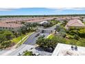 Scenic aerial view of the gated community entrance, showcasing the lush landscaping and well-maintained surroundings at 5312 6Th N Way, St Petersburg, FL 33703