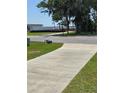 Home's sidewalk leading to a view of the water at 315 Shore E Dr, Oldsmar, FL 34677