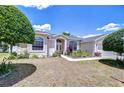 Inviting single-story home featuring a well-manicured lawn and charming curb appeal at 316 Crystal Goblet Ct, Valrico, FL 33594