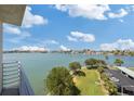 Expansive water view overlooking lush green space, parking, and gorgeous blue skies at 7912 Sailboat Key S Blvd # 508, South Pasadena, FL 33707