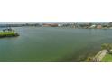 Picturesque waterfront vista with serene water, cityscape, and trees lining the shore at 7912 Sailboat Key S Blvd # 508, South Pasadena, FL 33707