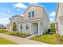 Charming two-story home with a well-manicured lawn and inviting entrance at 2019 Wild Heron Ct, Valrico, FL 33596