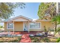 Charming single-story home featuring a well-maintained front yard and inviting entrance at 3823 N 56Th St, Tampa, FL 33619