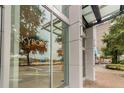 Exterior of building entrance featuring modern architectural design and prominent signage for easy identification at 777 N Ashley Dr # 2603, Tampa, FL 33602