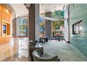 A grand lobby showcases soaring ceilings, ample seating, and expansive windows offering city views at 777 N Ashley Dr # 2603, Tampa, FL 33602