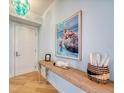 Welcoming entryway featuring a stylish console table, artwork, and elegant decor at 331 Cleveland St # 1806, Clearwater, FL 33755