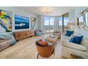 Bright living room with modern furniture, decor, and breathtaking water views at 331 Cleveland St # 1806, Clearwater, FL 33755