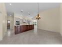Spacious kitchen with a large island, offering ample counter space and perfect for casual dining and entertaining at 5290 White Sand Ne Cir, St Petersburg, FL 33703