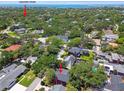 An aerial view highlighting the neighborhood's lush greenery and proximity to Swann Park at 4309 W Robin Ln, Tampa, FL 33609