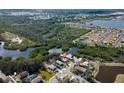 An aerial view showcases the property's proximity to the water and nearby park at 6908 11Th E Ave, Palmetto, FL 34221