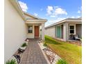 View of the pathway to the front door at 11819 Brighton Knoll Loop, Riverview, FL 33579