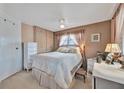 Cozy bedroom with built in cabinets and a ceiling fan, providing comfortable sleeping space at 123 Saint Kitts Way, Apollo Beach, FL 33572