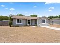 Inviting single-story home with a manicured lawn and charming curb appeal at 2214 Selkirk St, Valrico, FL 33594