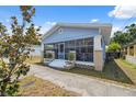 Charming single Gathering home featuring a screened-in front porch at 2217 Stuart St, Tampa, FL 33605