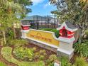 Suncoast Pointe community sign with lush landscaping and neighborhood playground at 2907 Mingo Dr, Land O Lakes, FL 34639