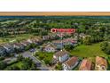 Aerial view of 3585 Torino Ln showcasing the property and surrounding golf course community at 3585 Torino Ln, Palm Harbor, FL 34683