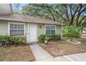 Charming condo featuring a well-maintained exterior with lush landscaping and a welcoming entrance at 602 Lynchburg Dr, Brandon, FL 33511