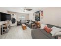 Comfortable living room with ceiling fan and great natural light at 602 Lynchburg Dr, Brandon, FL 33511