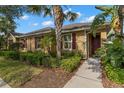 Charming home with well-maintained landscaping and inviting curb appeal at 11308 Temperley Pl, Tampa, FL 33625