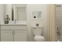 Modern bathroom featuring a sleek white vanity with a marble countertop and a stylish bathtub-shower combination at 11554 71St E Ave, Palmetto, FL 34221