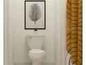 This half bathroom offers a toilet under an art print of a palm frond, and yellow striped curtains at 4033 Northern Key Dr, Plant City, FL 33563