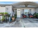 Welcoming front porch with comfortable seating and stylish decorative accents at 5004 Suwannee Dr, New Port Richey, FL 34652