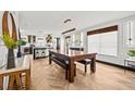 Open concept dining room with lots of natural light and stylish furnishings at 616 Wheaton Trent Pl, Tampa, FL 33619