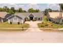 Lovely single-story home with well-kept lawn and landscaping, centrally located in a pleasant community at 8712 Ashbury Dr, Hudson, FL 34667