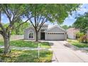 Charming single-Gathering home with a well-manicured lawn and inviting curb appeal at 1177 Emerald Hill Way, Valrico, FL 33594