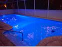 Inviting private pool with underwater lighting perfect for evening swims at 2042 Craft Ln, Sarasota, FL 34239