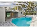 Beautiful screened-in pool with ample deck space for entertaining and relaxing at 2042 Craft Ln, Sarasota, FL 34239