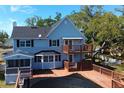 Multi-level wooden decks offer great outdoor space to this home at 219 Galaxy Ave, Spring Hill, FL 34606