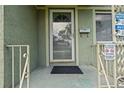 A close-up of the front door with a screen, showcasing security and a welcoming entrance at 2435 37Th N Ave, St Petersburg, FL 33713