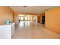 Spacious living area with ample natural light and neutral paint, ready for personalization at 9469 Treasure Ne Ln, St Petersburg, FL 33702