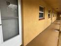 Apartment exterior showcasing the unit door with white trim and the apartment number at 1301 S Hercules Ave # 19, Clearwater, FL 33764