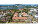 Aerial view of waterfront townhomes nestled near the Intracoastal Waterway, offering scenic views at 14506 Alejo Ct, Seminole, FL 33776