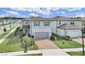 Charming two-story home with brick driveway and well-manicured landscaping at 17737 Everlong Dr, Land O Lakes, FL 34638