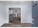 Inviting foyer with modern flooring and a glimpse into the spacious living area at 19496 Wildwood Dr, Brooksville, FL 34601