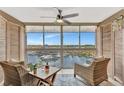 Relaxing lanai with comfortable seating and expansive views of the marina at 4939 Floramar Ter # 504, New Port Richey, FL 34652