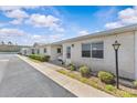 Attractive single-story home with a well-kept lawn and carport at 12400 Park Blvd # 210, Seminole, FL 33772
