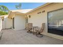 Condo patio featuring a table and chairs at 1300 Shady Pine Way # B, Tarpon Springs, FL 34688