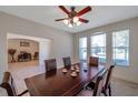 Elegant dining room with natural light, connecting to the office and offering a spacious feel at 2218 Valterra Vista Way, Valrico, FL 33594
