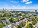 Neighborhood aerial view featuring the home's location near the bay and cityscape at 3117 W Knights Ave, Tampa, FL 33611