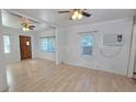 Spacious, bright living area featuring laminate floors with easy access to the entryway and hallways at 342 N 40Th N St, St Petersburg, FL 33713